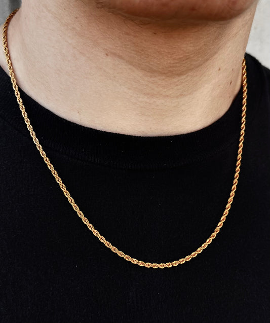 gold 20 inch 2mm rope chain on a guys neck wearing a black shirt